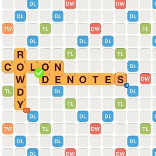 WWF game with the words colon, rowdy, and denote played on the board. An "S" is added at the end of denote, forming denotes, to show an example of pluralizing.