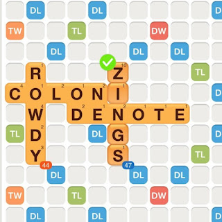 WWF game with the words colon, rowdy, and denote played on the board. The word "zings" is added, showing an example of utilizing bonus tiles.